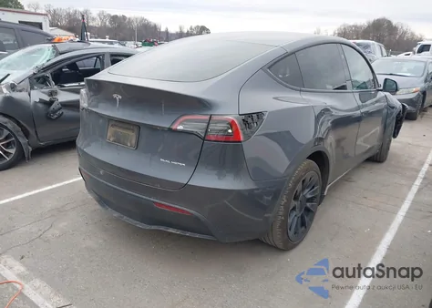 2023 Tesla Model Y Awd/Long Range Dual Motor All-Wheel Drive z USA, uszkodzony, nr VIN 7SAYGAEE5PF903249